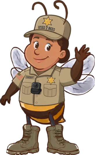 Female Used 2 Bees sheriff mascot in a tan and brown uniform with SHERIFF tape, gold star badge, campaign hat star and a duty belt