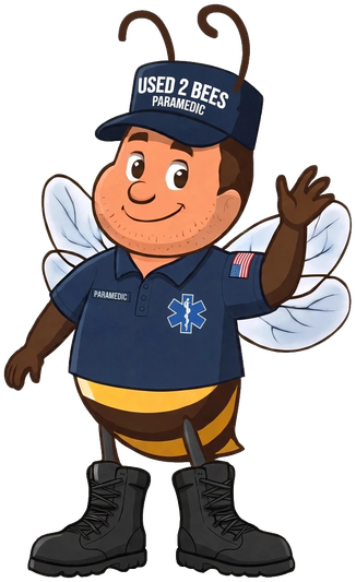 Male Used 2 Bees Paramedic mascot in a navy polo shirt with a blue Star of Life and PARAMEDIC tape, navy USED 2 BEES cap and black boots