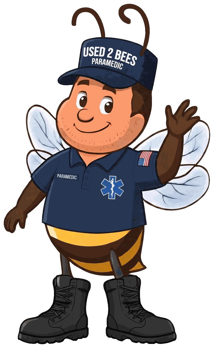 Male Used 2 Bees Paramedic mascot in a navy polo shirt with a blue Star of Life and PARAMEDIC tape, navy USED 2 BEES cap and black boots